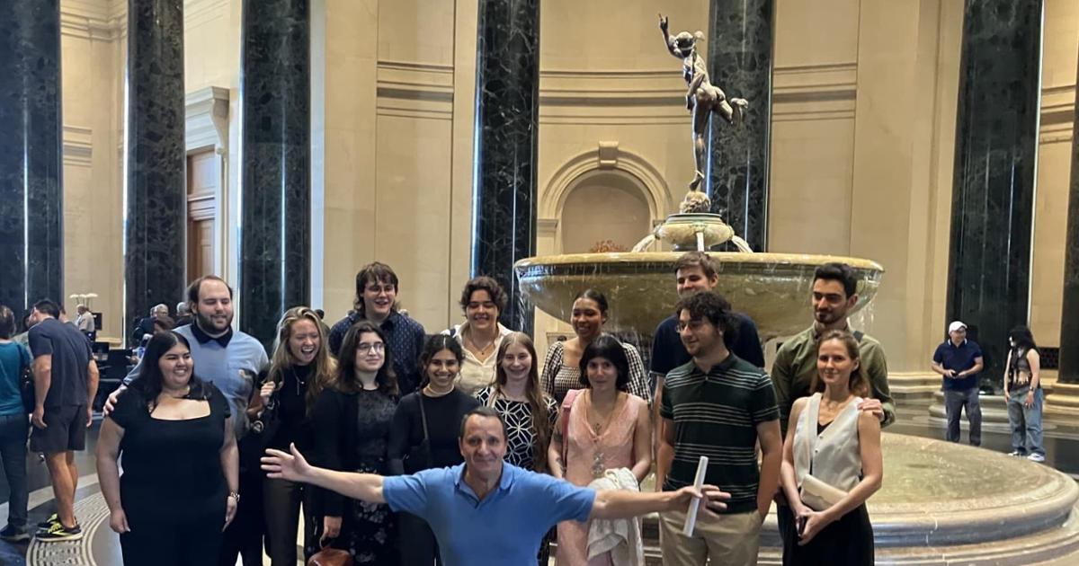 FA2024 NGA student tour photovin front of a stone water fountain