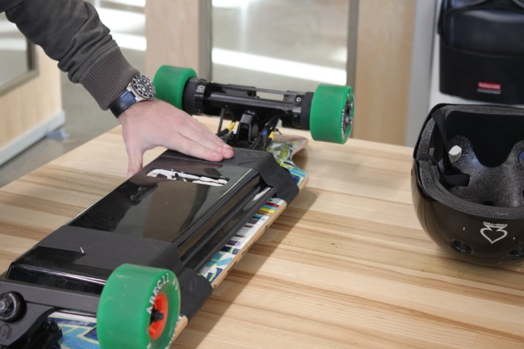 The battery on the underside of Tomy's skateboard