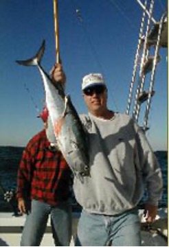 Kiefer holding up fish