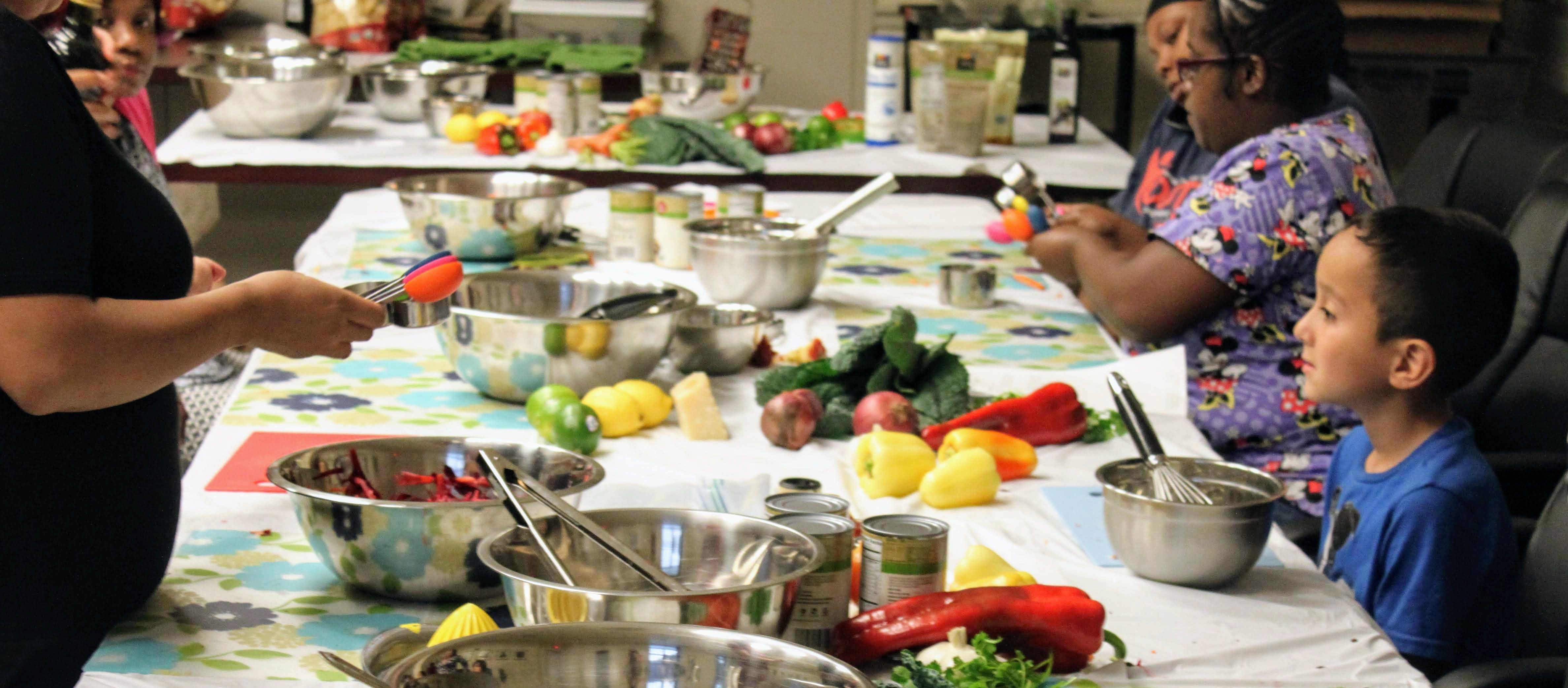 families learning how to cook healthy meals 