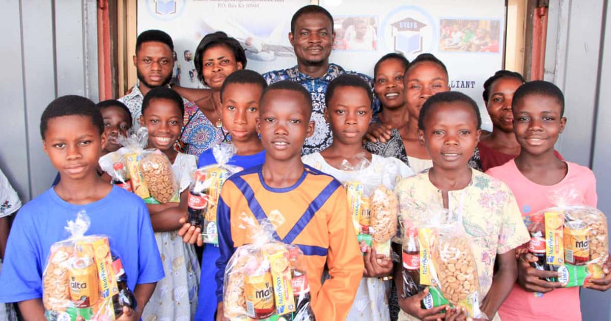 Nana Boakye Yiadom and the first cohort of students at Stand Together Ghana 