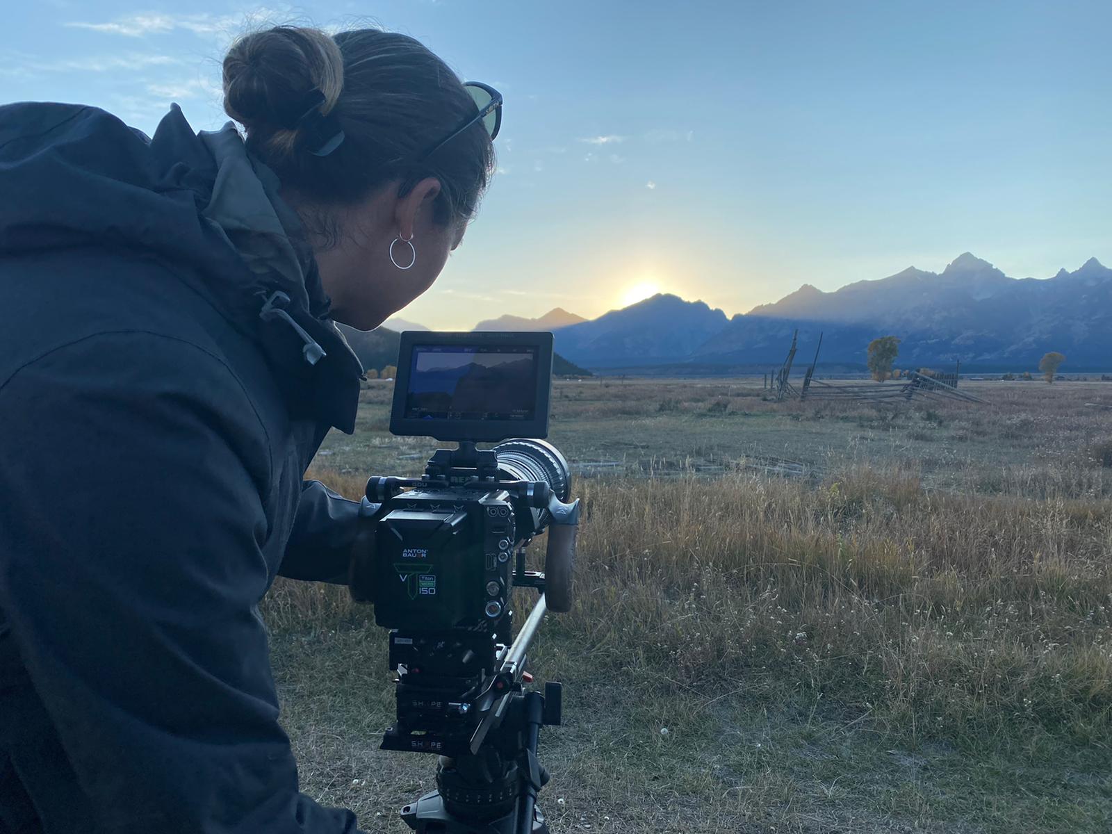 Photographer sets up shot across horizon