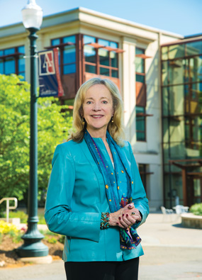 Sherry Lee Mueller in front of AU's School of International Service