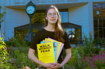 Emma Busch in front of the library