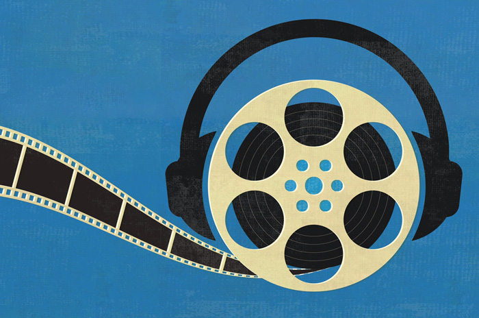 film reel with headphones