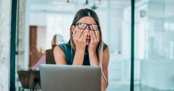 Woman sitting in front of a computer