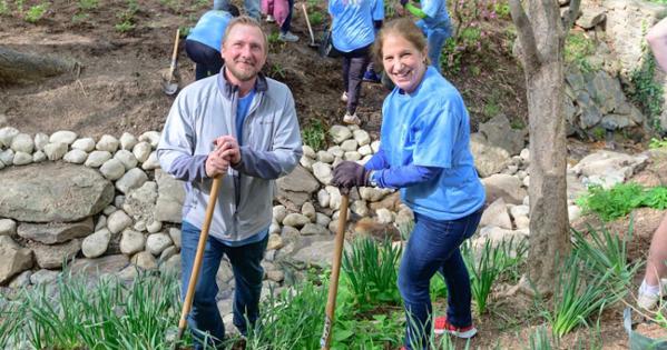 Sylvia Burwell holds a shovel. Photo by Jeff Watts.