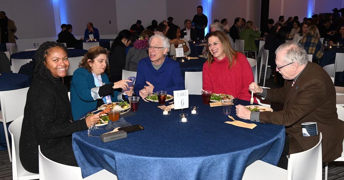 AU community members talk during the third Unity Meal.