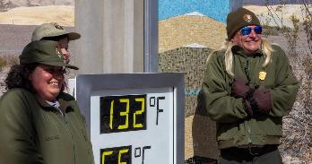 US Park Rangers at Death Valley's Furnace Creek on a 132-degree day, July 16. (Photo by David McNew/Getty Images)