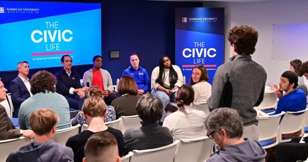 An AU student asks a question during the Perspectives on the Civic Life Presidential Speaker Series event. Photo by Jeff Watts.