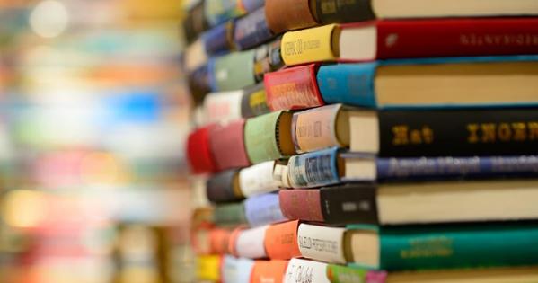 a colorful stack of books in a library