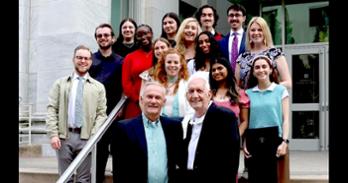 Rodger Streitmatter and Thomas Grooms pose with the Journalism award winners.