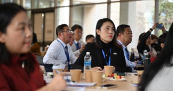 Audience members from China listen to Dr. Snyder.