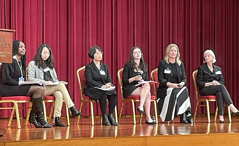 Presenters on stage at the Chinese embassy.