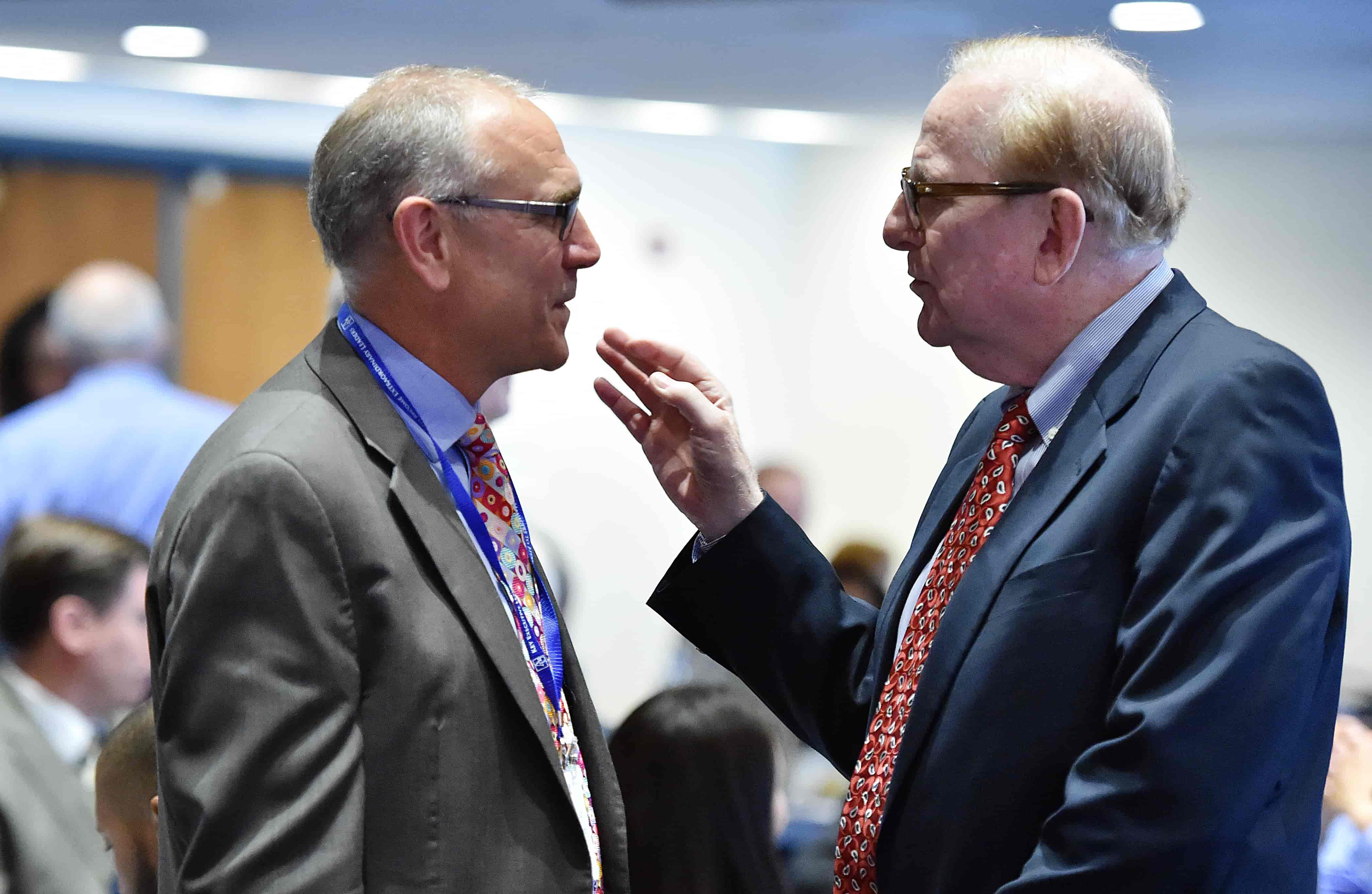 Don Zauderer speaking to man at 2015 Conference