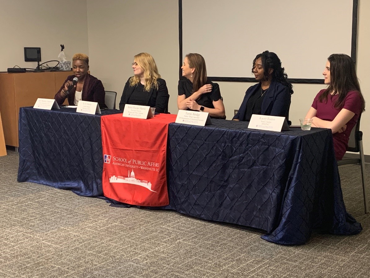 The panelists speaking during the panel