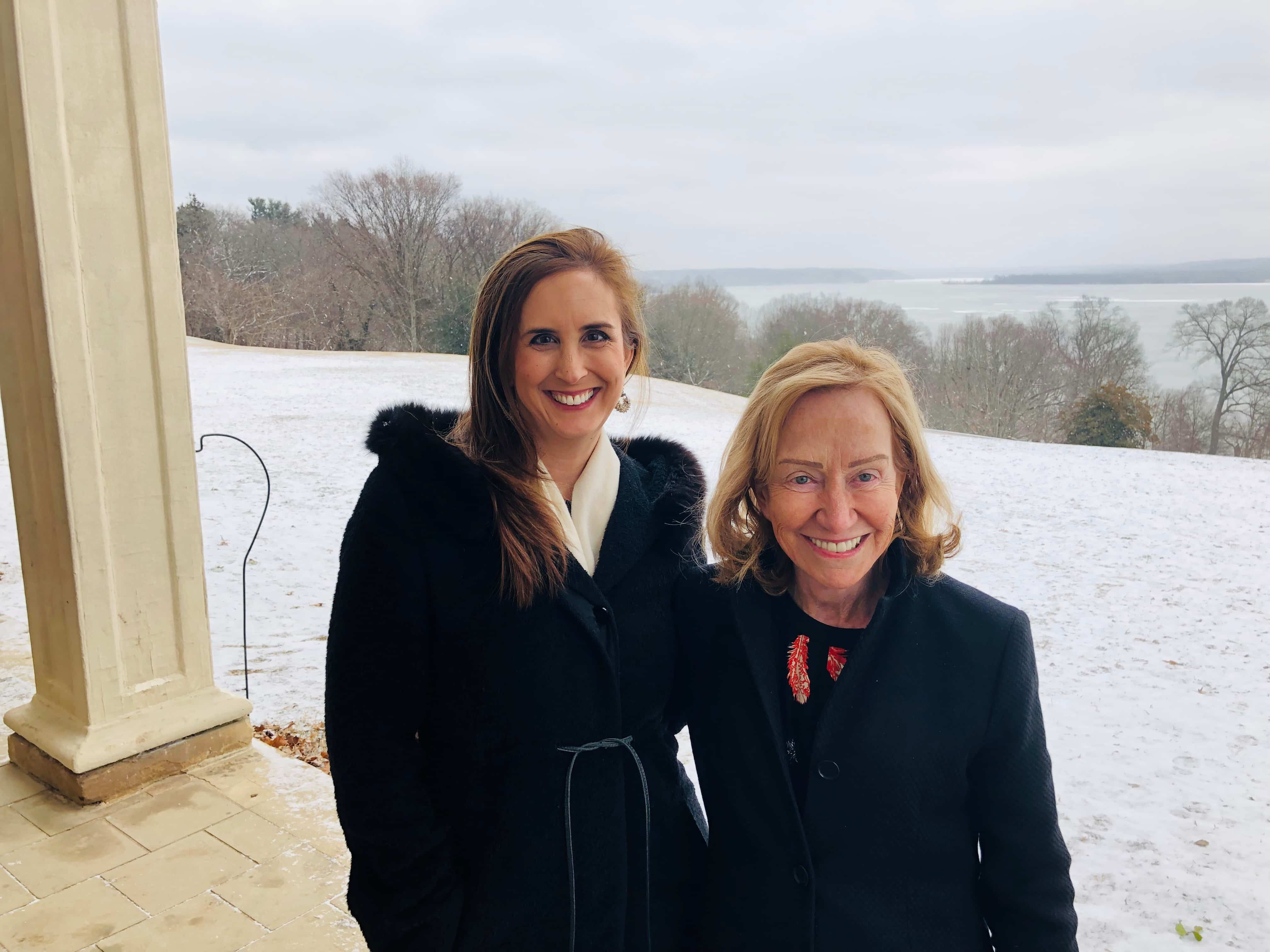 Betsy and Doris standing together outdoors.