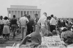 A crowd of African American and white people on the grounds of the Lincoln Memorial on August 28, 1963.