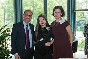 Alumna Sophia Vos with Dan Myers and Mary Clark